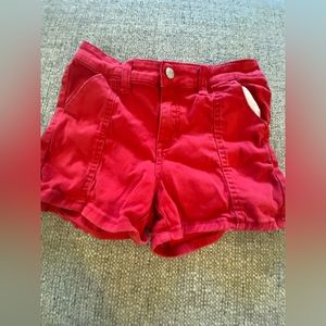 red shorts